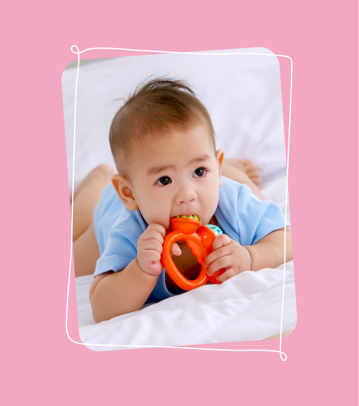 Baby playing with a toy